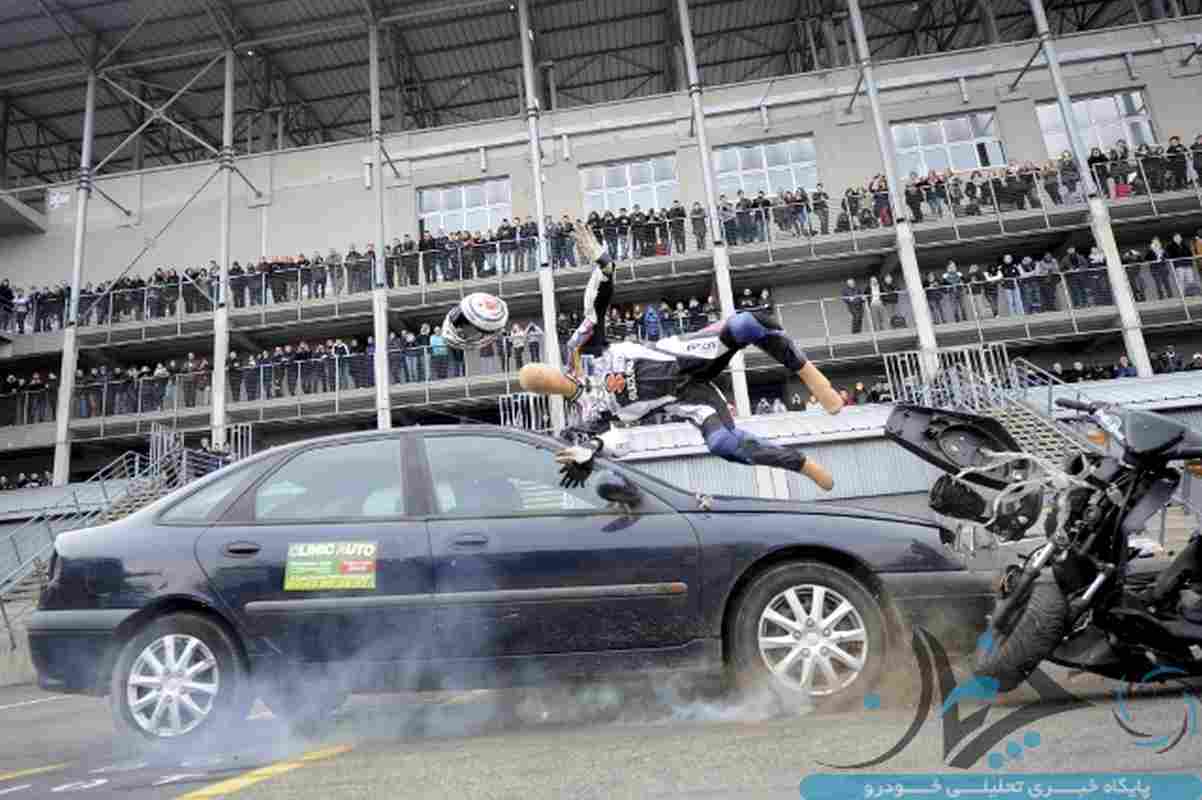 Students watch as a car driving at 70 km/h hits a dummy on a scooter in Le Mans, north-western France, on November 20, 2014, during a crash test organized to raise awareness among high school students of the risks of road traffic. AFP PHOTO/ JEAN-FRANCOIS