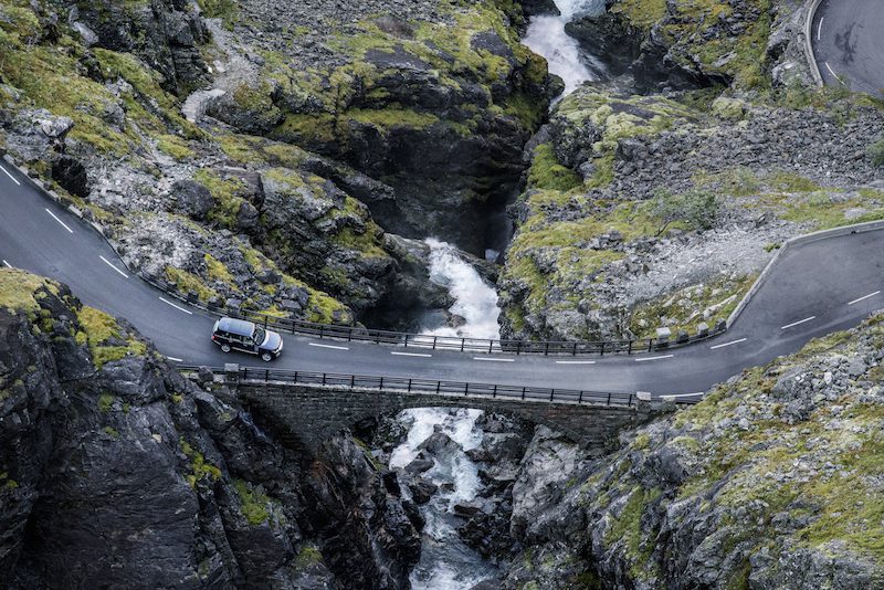NORWAY. 2016. Trollstigen. The famous Trollstigen road, a series of switchbacks winding its way through a steep cliffside near Åndalsnes. Photographed on assignment from Land Rover.