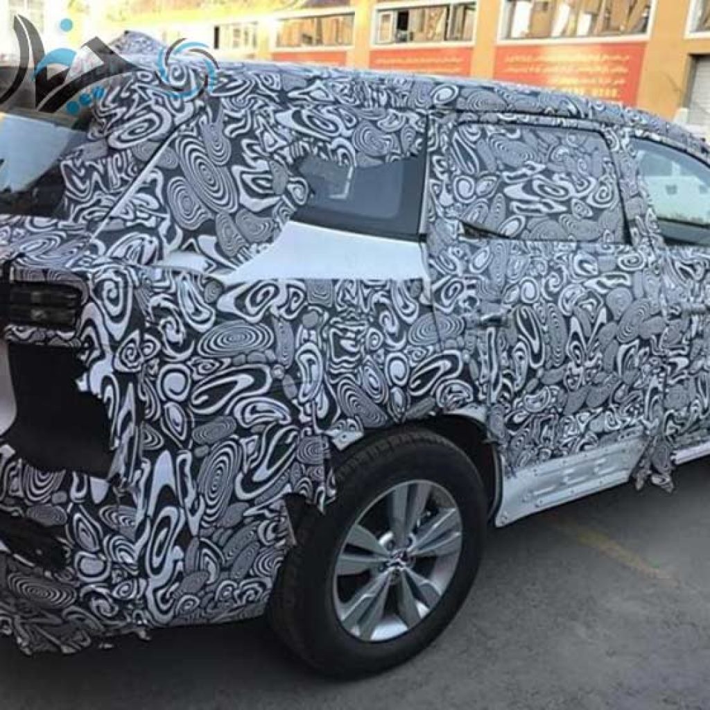 چری در حال کار بر روی خودرو شاسی‌بلند با 7 صندلی + عکس