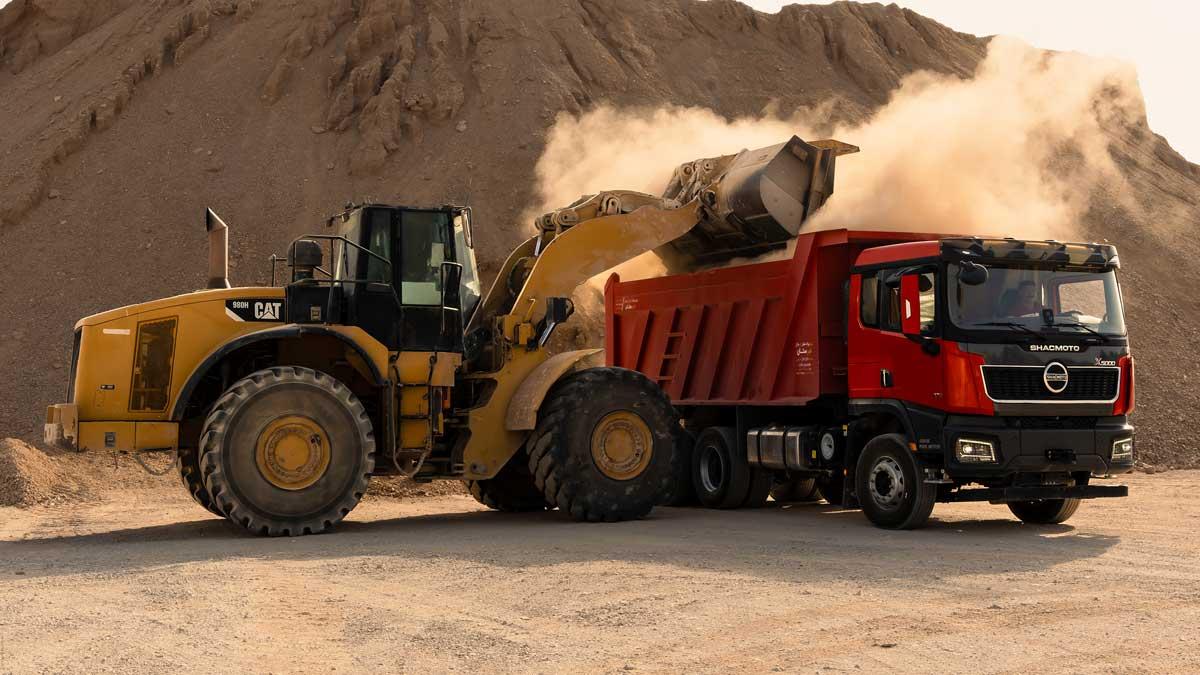 نقش کلیدی کامیون‌های کمپرسی و میکسر (X5000D) SHACMOTO در صنعت بتن