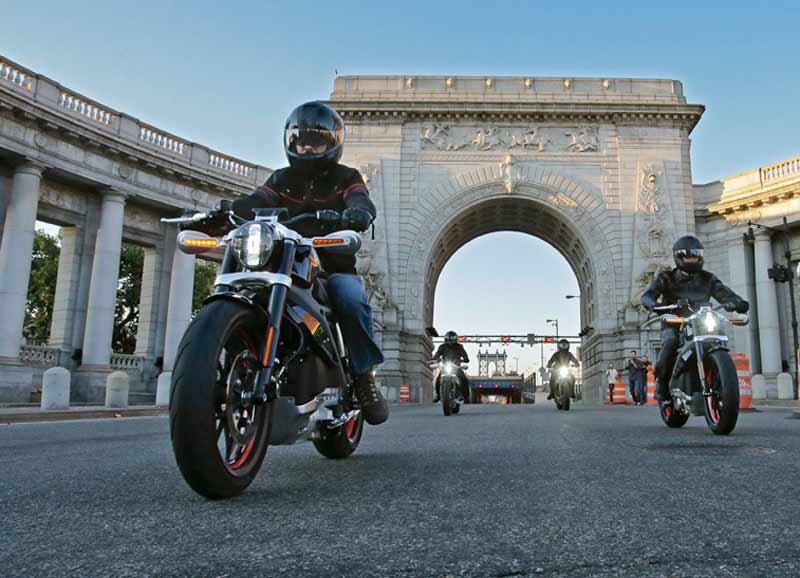 Riders introduce Project LiveWire—the first electric Harley-Davidson motorcycle—as they exit the Manhattan Bridge in New York, June 23, 2014. While not for sale, starting today select consumers across the United States will be able to ride and provide feedback on the new motorcycle during a series of events scheduled through the remainder of the year. Ray Stubblebine/Harley-Davidson